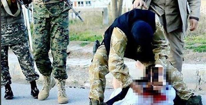 داعشي يدعو أقاربه لحضور عملية نحر والده ..وقام بتصوير جريمته !