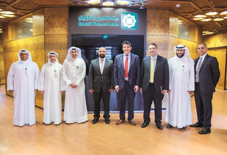 لقطة جماعية تضم موظفي بيتك مع ممثلي شركة NCR