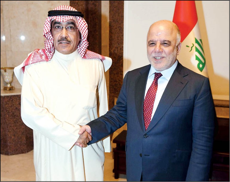 رئيس الوزراء العراقي دحيدر العبادي مع نائب رئيس اتحاد الصحافيين العرب ونائب رئيس التحرير الزميل عدنان الراشد هاني الشمري