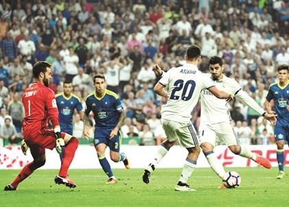 الفارو موراتا افتتح اول اهدافه مع الملكي بتسجيله الهدف الاولرويترز