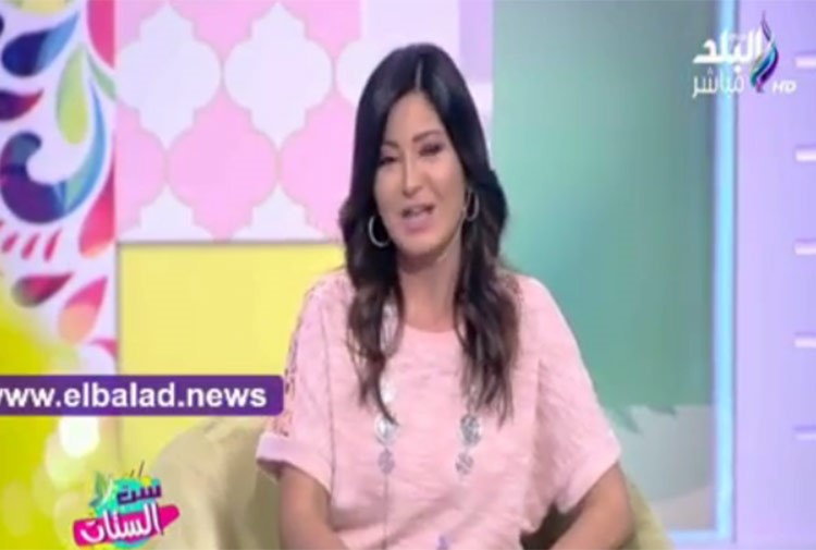 بالفيديو.. مذيعة مصرية تهدد زوجها على الهواء