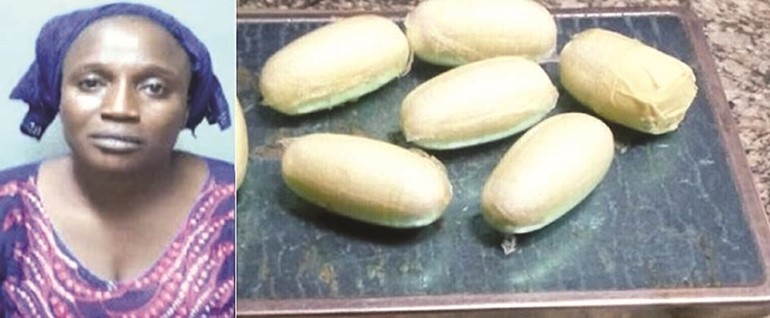 المهربة النيجيرية وبجوارها الهيروين المهرب﻿
