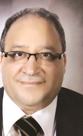 الوزير المفوض التجاري المصري مدحت عادل ﻿
