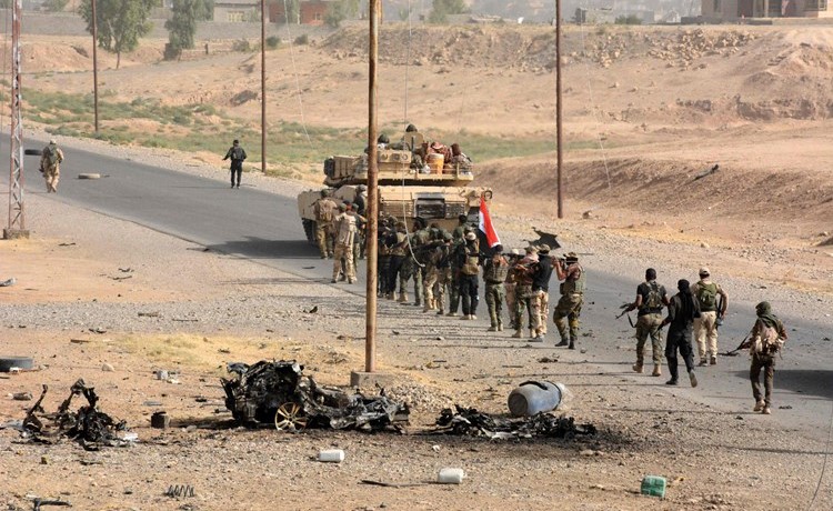 القوات العراقية تنتشر في بلدة الشرقاط عقب استعادتها امس الاول	 افپ﻿