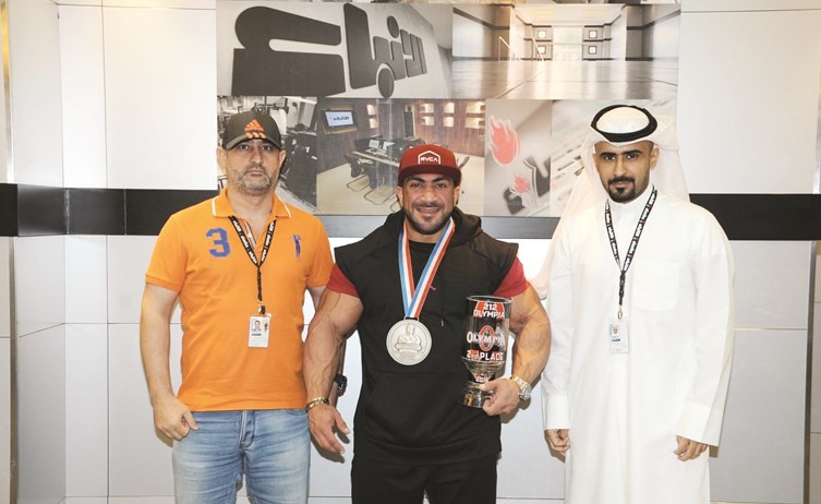 وصيف مستر اولمبيا مع الزميلين سمير بوسعد ويحيى حميدان﻿