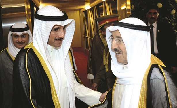 صاحب السمو الامير الشيخ صباح الاحمد مصافحا مرزوق الغانم﻿