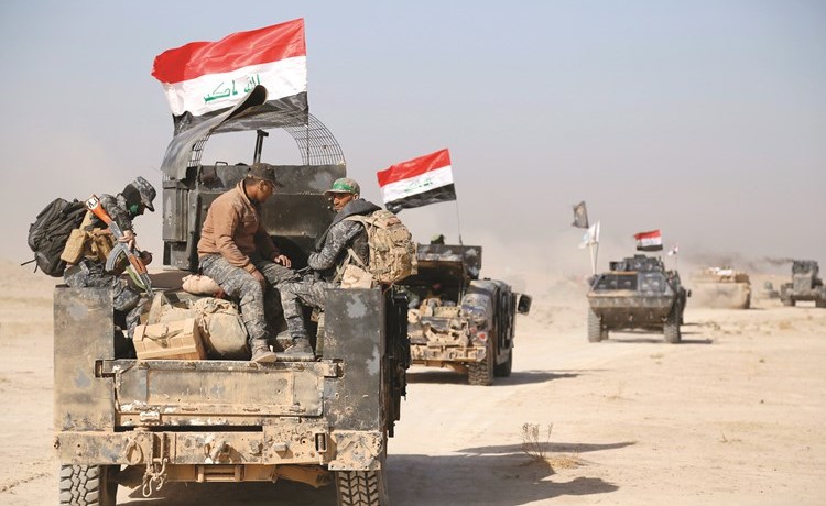 القوات العراقية تتقدم في حقل القيارة خلال عمليات معركة الموصل امس	 رويترز﻿