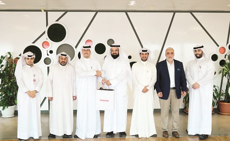 صورة جماعية لفريق Ooredoo وجمعية النوري الخيرية﻿