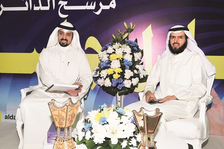 الدمخي متحدثا للحضور	(زين علام)﻿