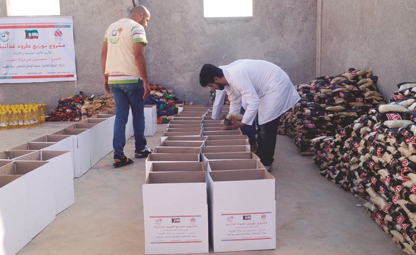 توزيع طرود غذائية ﻿