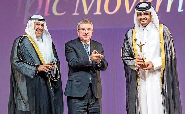 جائزة «أنوك» للإسهام في الحركة الأولمبية لأمير قطر الشيخ تميم بن حمد يتسلمها بدلا منه الشيخ جوعان بن حمد بحضور الشيخ أحمد الفهد وتوماس باخ