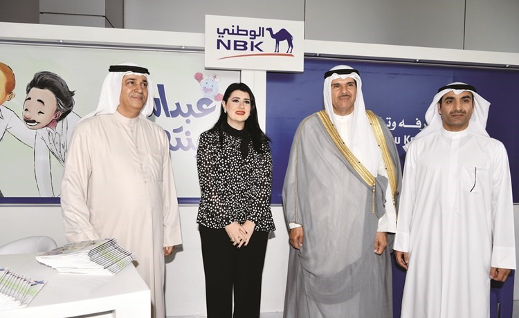 الوزير الحمود واليوحة والعنزي في جناح البنك الوطني ﻿