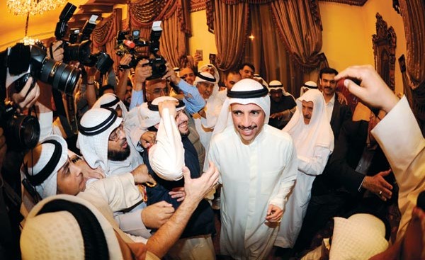 مرزوق الغانم يتلقى التهاني بعد حلوله في المركز الأول          (هاني الشمري)