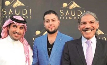 إبراهيم الحساوي في أيام الفيلم السعودي بلوس انجيليس مع المخرج بدر الحمود والممثل مشعل المطيري﻿