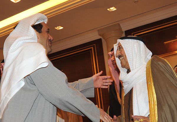 صاحب السمو الامير الشيخ صباح الأحمد مصافحاً السيد فواز خالد المرزوق