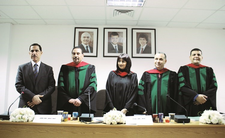 الزميلة هديل الفهد مع د.زهير الطاهات ود.عبدالباسط شاهين ود.أحمد حسين ﻿