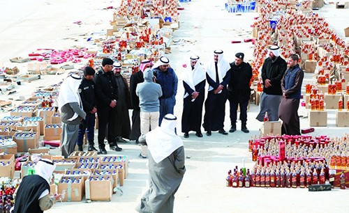إتلاف 23663 زجاجة خمر على دفعتين