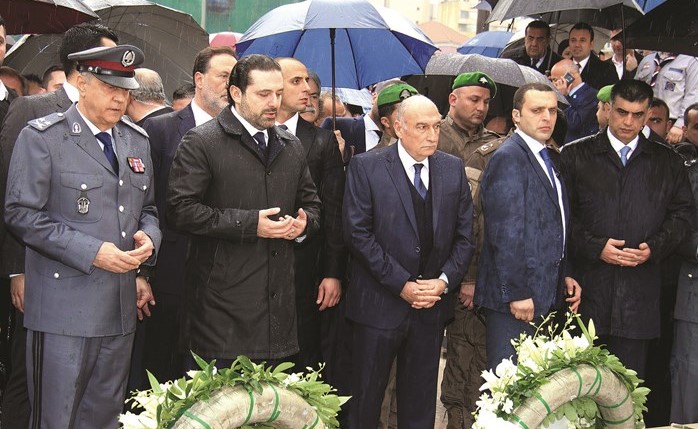 رئيس الحكومة سعد الحريري خلال زيارته ضريح الرئيس الشهيد رفيق الحريري في الذكرى 12 لاغتياله بحضور المدير العام لقوى الامن الداخلي اللواء ابراهيم بصبوص(محمود الطويل) ﻿