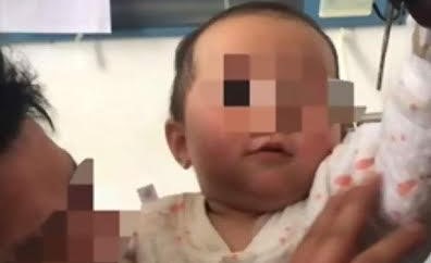 بالصور.. أم تلقي رضيعها في النهر وسائق أجرة ينقذه بأعجوبة
