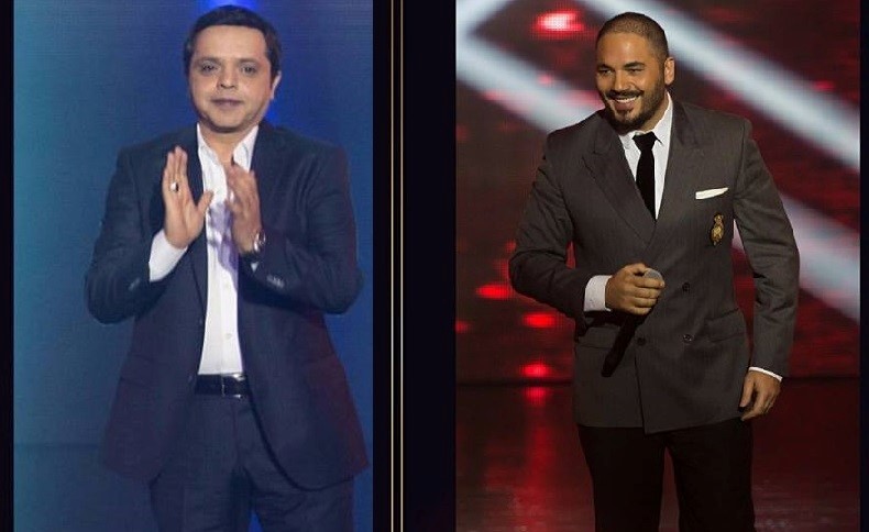 بالفيديو.. محمد هنيدي يضحك بهستيريا بعد تقليد رامي عياش لهذا الفنان الشهير