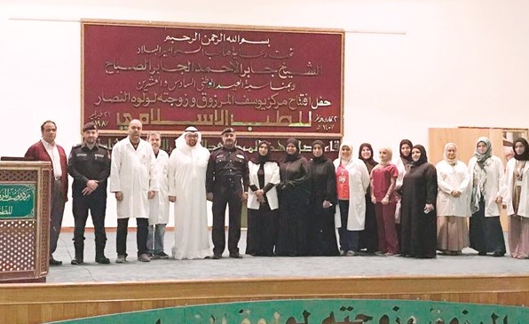 موظفو المركز وفريق الإطفاء عقب التدريبات﻿