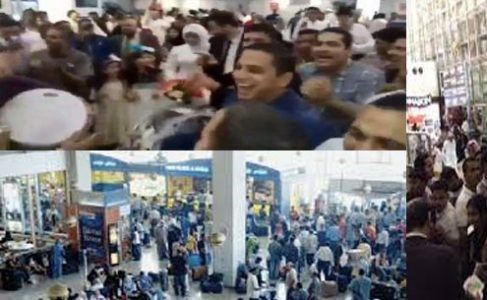 بالفيديو.. مصري يستقبل عروسه بالفستان الأبيض بمطار المدينة وأصدقاؤه يحتفلون بـ "زفة مصرية"