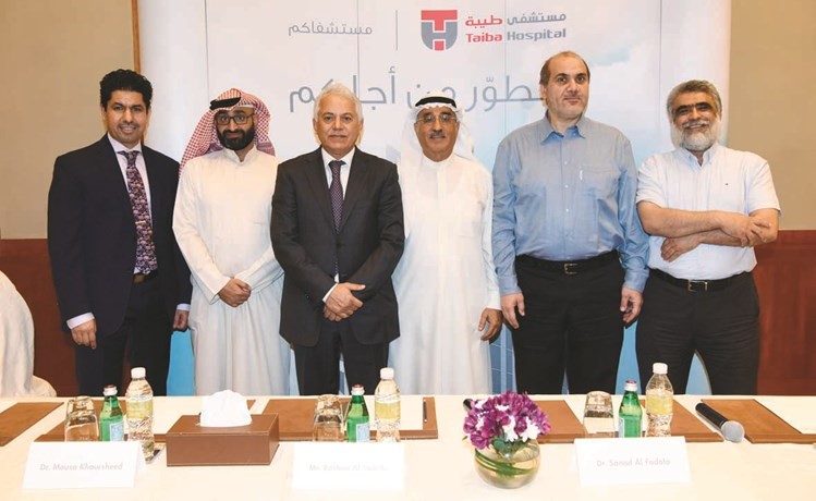 لقطة جماعية لمجموعة الأطباء المساهمين﻿