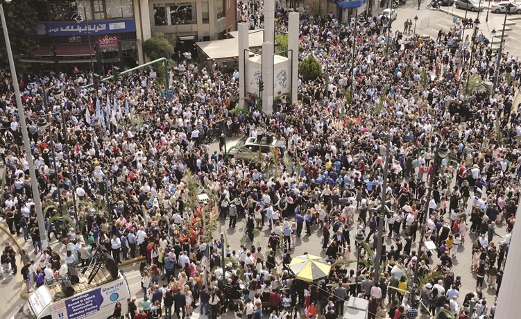 الطائفتان المارونية والارثوذكسية تشتركان في إحياء أحد الشعانين في الاشرفية(محمود الطويل)﻿