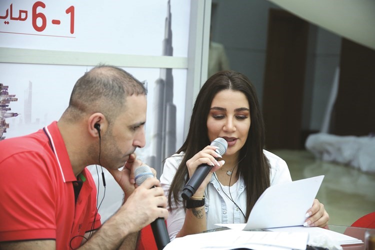 أسامة فودة وأمل عنبر وبث مباشر من المعرض﻿
