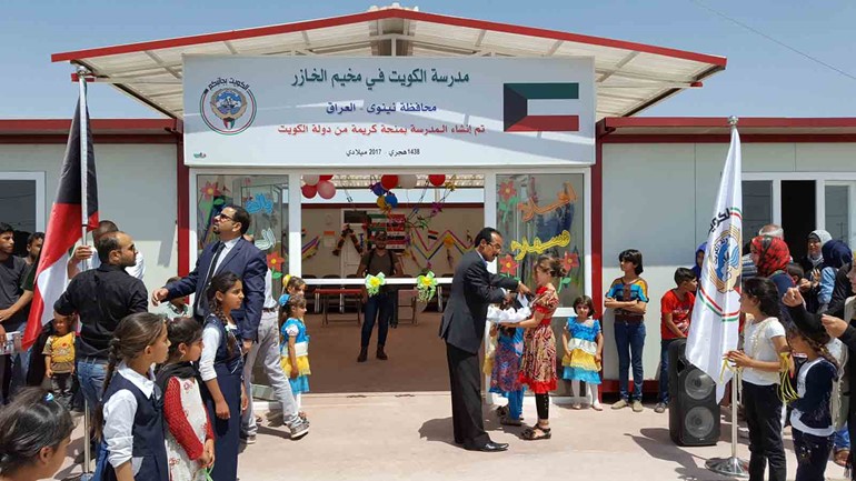 شكراً للكويت.. رسائل طبعت على جدار مدرسة بالعراق