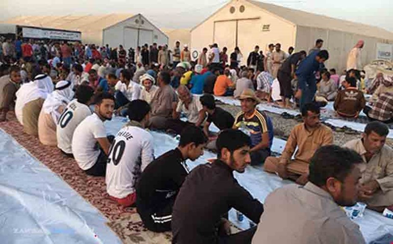 وفاة نازحَين وتسمم 750 بمخيم عراقي بعد توزيع وجبات إفطار منتهية الصلاحية