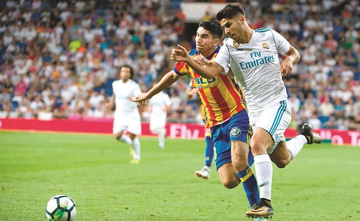 ماركو أسنسيو سجل هدفي ريال مدريد في المباراة												(أ.ف.پ)﻿
