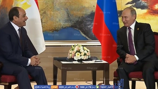 فلاديمير بوتين خلال لقائه عبد الفتاح السيسي على هامش أعمال قمة "بريكس"