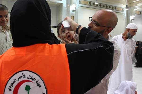 تعرف على قصة صاحبات السترات البرتقالية بالحرم المكي!