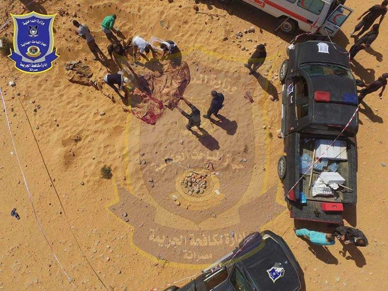 بالصور .. انتشال جثث الأقباط المصريين الـ21 ضحايا داعش في سرت