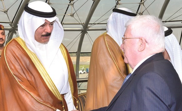 الشيخ محمد الخالد مصافحا الرئيس العراقي﻿