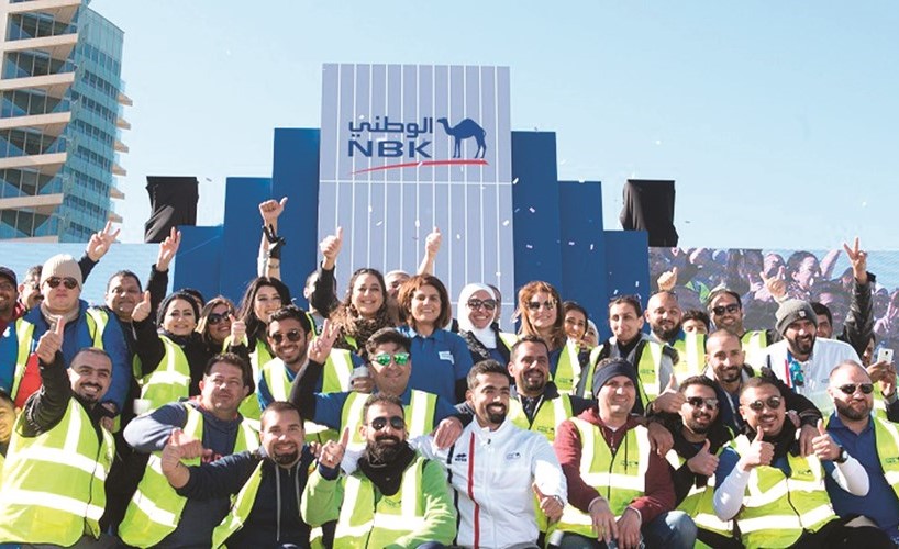 لقطة جماعية لمتطوعي الوطني بالسباق﻿