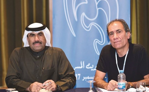 هوشنك وزيري ورئيس المركز الإعلامي الزميل مفرح الشمري في المؤتمر﻿
