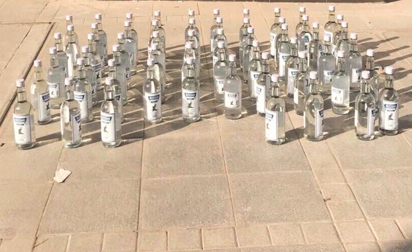 قناني الخمر المستورد في قبضة الامن﻿