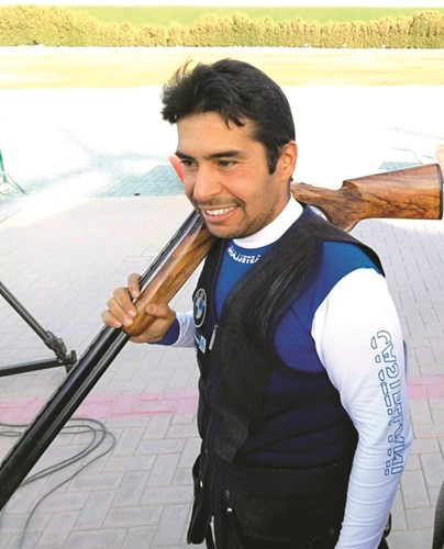 الرامي خالد المضف بعد فوزه بالمركز الاول﻿