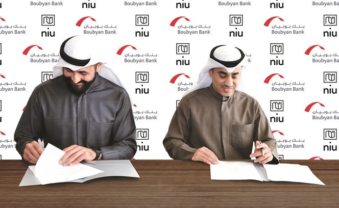  التويجري والحواج أثناء توقيع الاتفاقية﻿