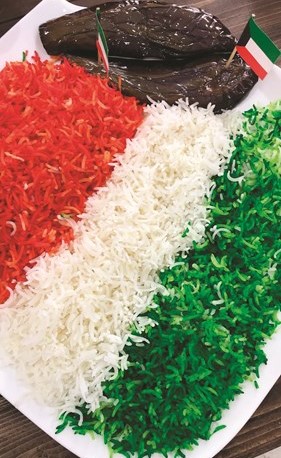 أحد الأطباق بألوان علم الكويت﻿