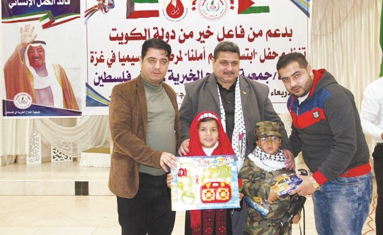 جانب من تسلم الهدايا المقدمة من الشعب الكويتي للأطفال المصابين بمرض الثلاسيميا ﻿
