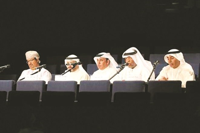 عبدالله الرميثان وعبدالله المرشد مع أعضاء لجنة التحكيم﻿