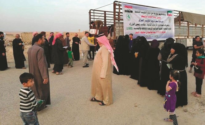 حملة «الكويت بجانبكم» توزع 5 آلاف سلة غذائية على الأسر العراقية العائدة إلى الأنبار