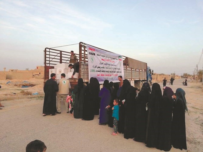 حملة «الكويت بجانبكم» توزع 5 آلاف سلة غذائية على الأسر العراقية العائدة إلى الأنبار