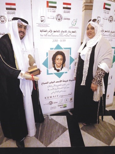 علي العلي والزميلة هناء السيد ﻿