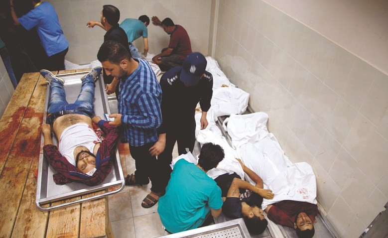 عدد من شهداء المجزرة الإسرائيلية في مشفى غزة													(ا.ف.پ)﻿