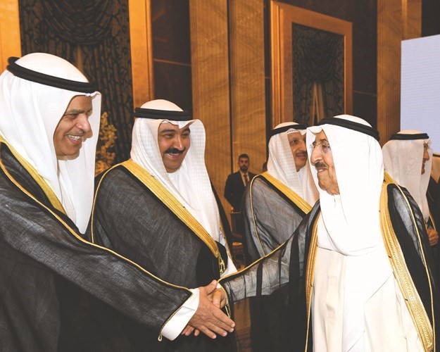 سمو الأمير مهنئا السفير علي السعيد ويبدو وليد الخبيزي﻿