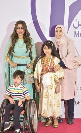 شيماء مع عدد من ذوي الهمم﻿